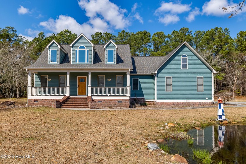 Interior pictures are here! Nestled on a partially wooded 1.67 - photo 2