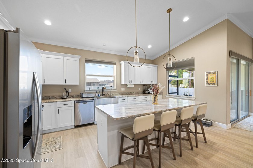 Welcome to this meticulously updated 4-bed, 3-full bath home - photo 7