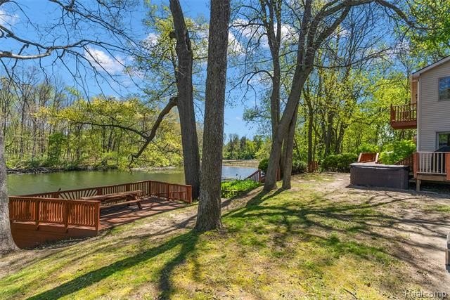 Situated on 1.13 acres with 150 feet of waterfront on the canal - photo 42