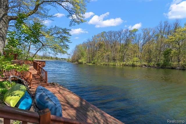 Situated on 1.13 acres with 150 feet of waterfront on the canal - photo 46
