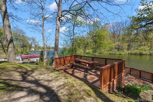 Situated on 1.13 acres with 150 feet of waterfront on the canal - photo 49