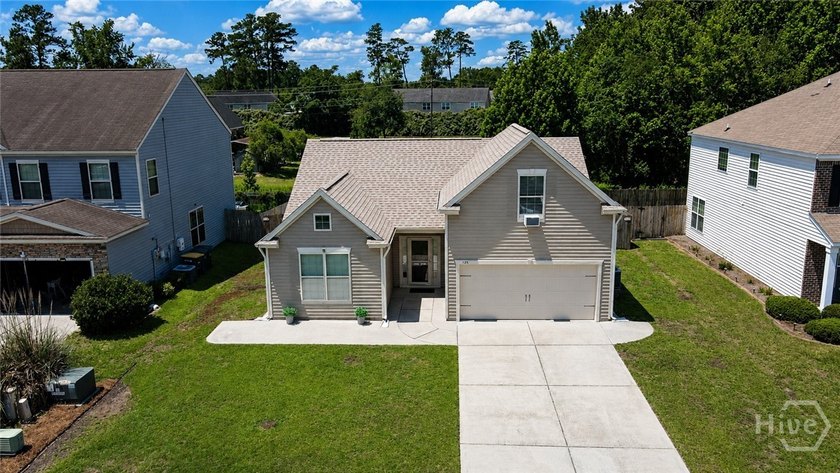 This beautifully maintained 4-bedroom, 2-bath home offers the - photo 2