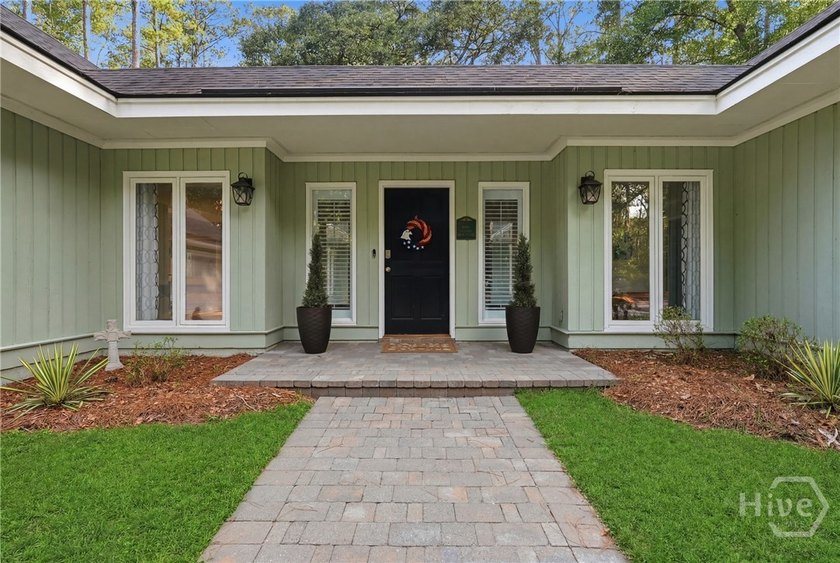 Nestled within the prestigious gated community of The Landings - photo 3