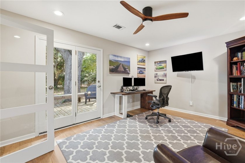 Nestled within the prestigious gated community of The Landings - photo 7