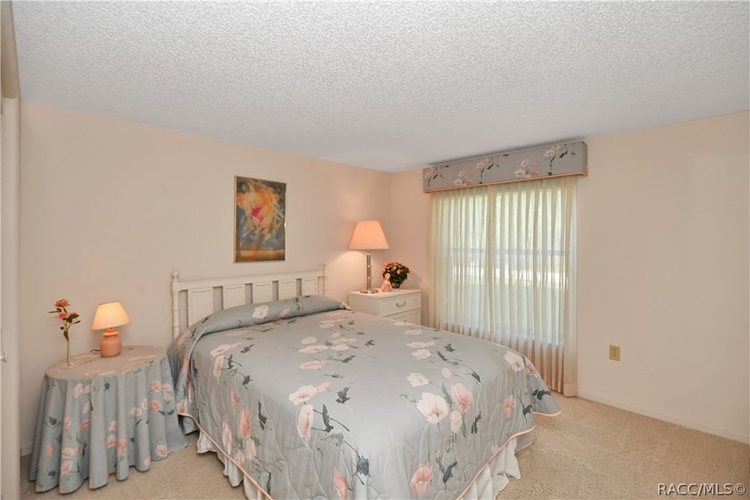 A MUST see... A rare find! This spacious charming 1986-built one - photo 21