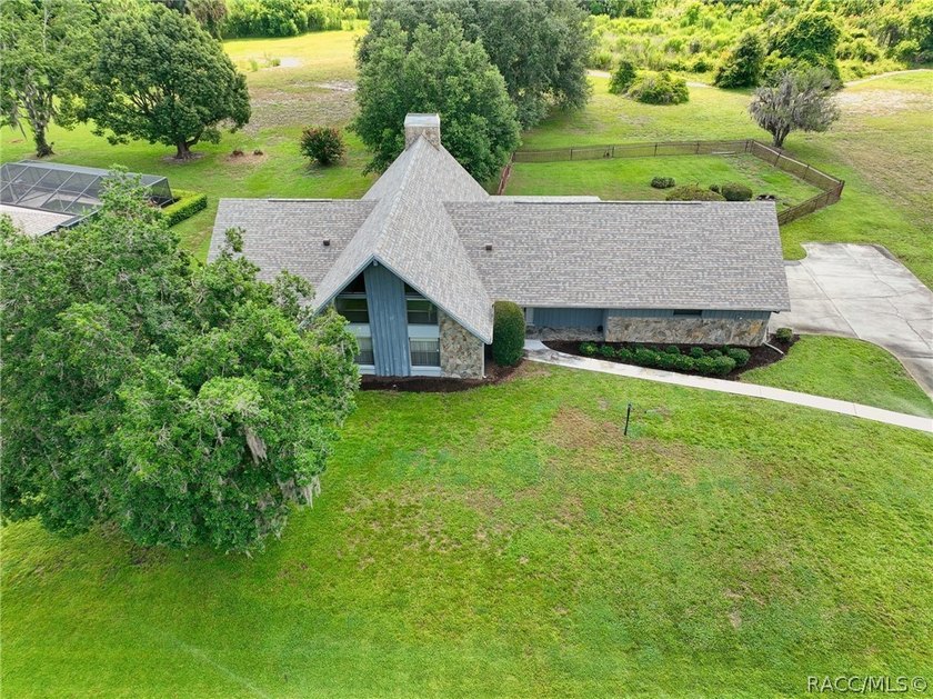 A MUST see... A rare find! This spacious charming 1986-built one - photo 29