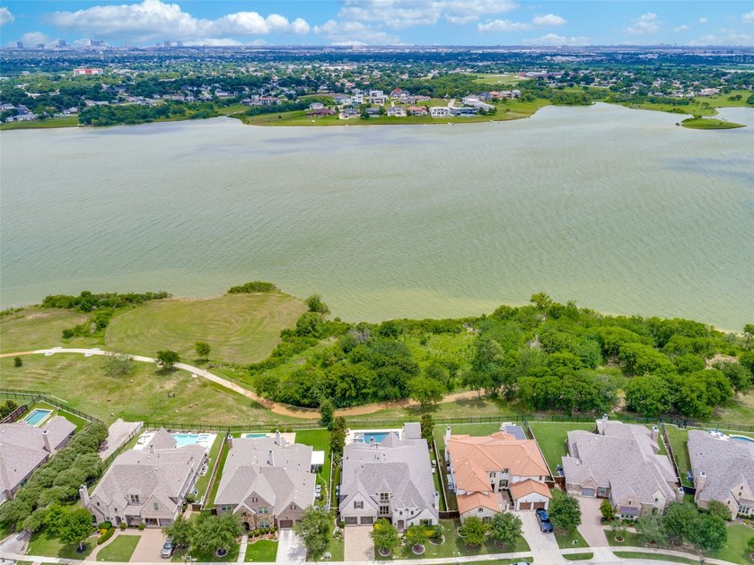 Lakeside luxury meets resort-style living in this exceptional - photo 36