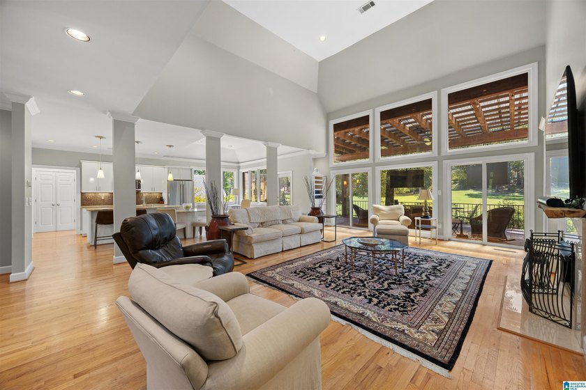 WOW factor! Instantly notice soaring ceilings, panorama views of - photo 8