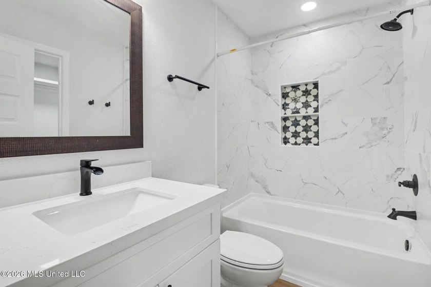 Two Primary Suites! Fully Renovated... loooks and feels - photo 13