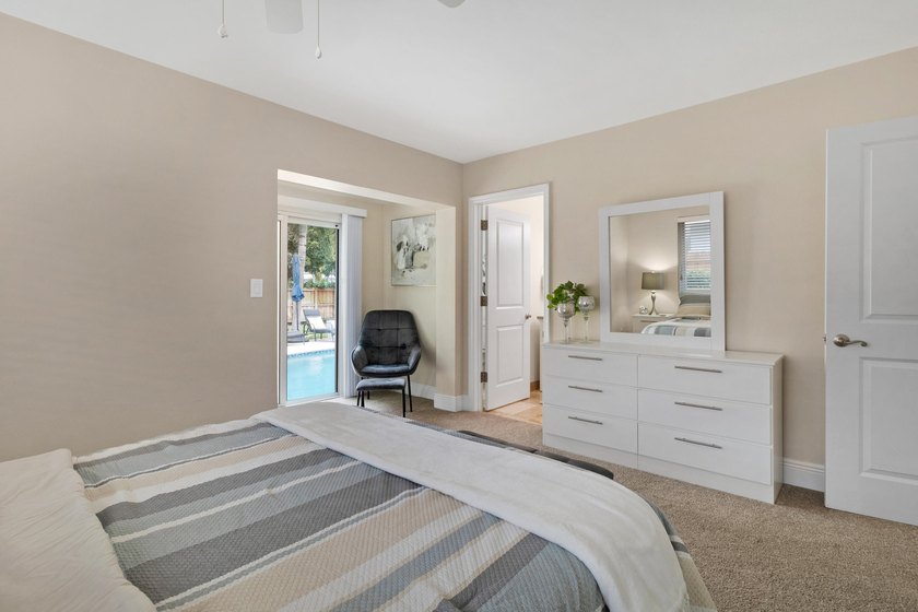 Discover this beautifully maintained 3-bedroom, 2-bath pool home - photo 13