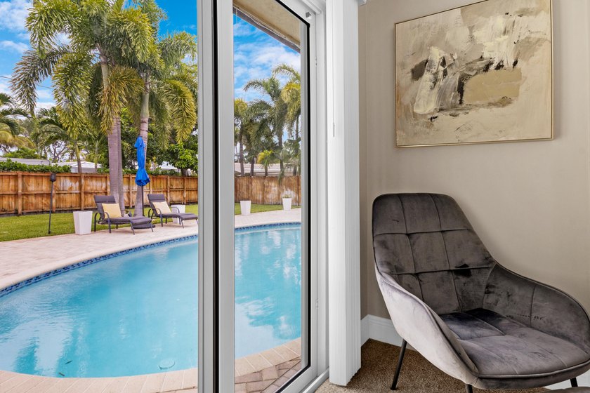 Discover this beautifully maintained 3-bedroom, 2-bath pool home - photo 14