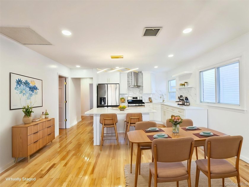 Beautifully renovated detached single-family home located in the - photo 2