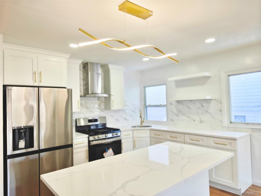 Beautifully renovated detached single-family home located in the - photo 9