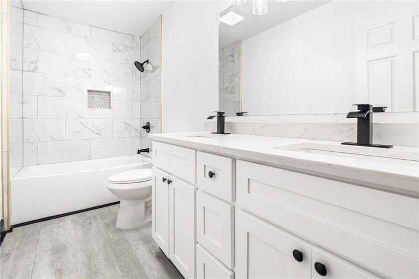 Immaculately Turn Key Renovated Home. The home includes Four (4) - photo 21