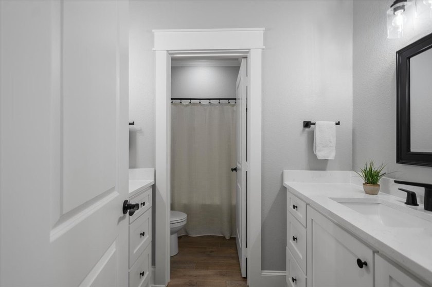 Almost new and brimming with farmhouse charm, this four bedroom - photo 14