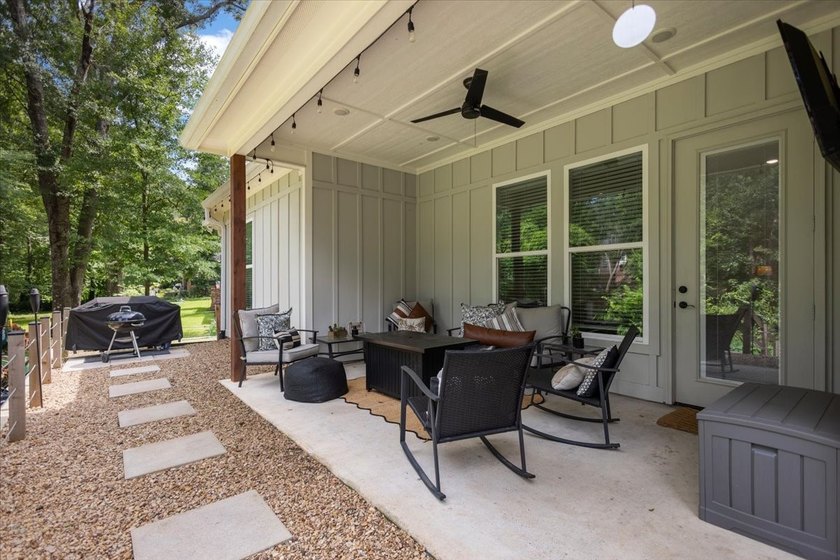 Almost new and brimming with farmhouse charm, this four bedroom - photo 35