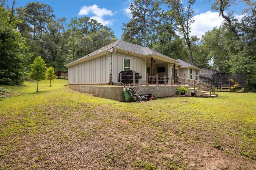 Almost new and brimming with farmhouse charm, this four bedroom - photo 38