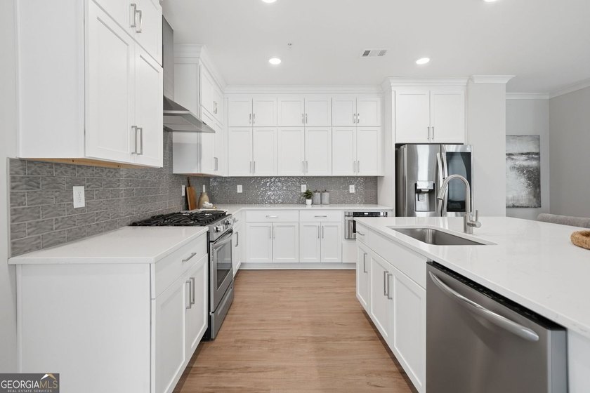 Experience elevated living in this better-than-new luxury - photo 8