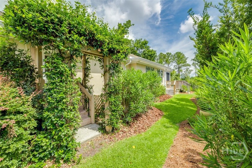This unique home in the gated community of Causton Bluff has it - photo 10