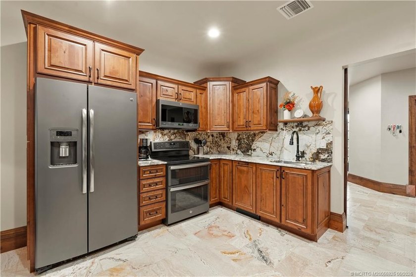 Experience elevated coastal living in this luxurious 5BD 3.5BA - photo 45