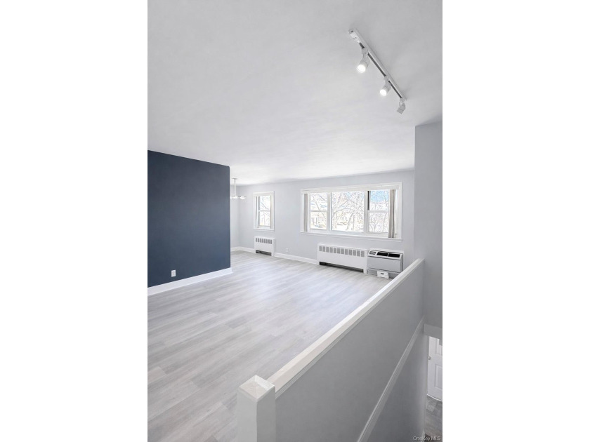 Welcome home to this sun-filled second-floor corner unit in a - photo 2