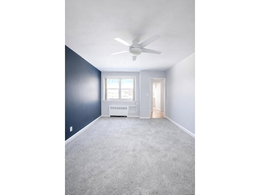 Welcome home to this sun-filled second-floor corner unit in a - photo 4