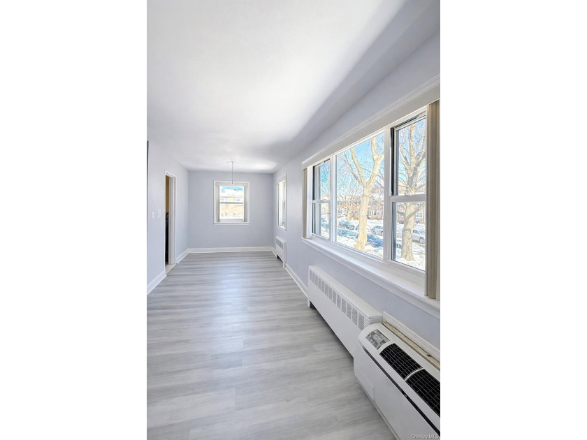 Welcome home to this sun-filled second-floor corner unit in a - photo 5