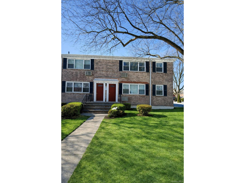 Welcome home to this sun-filled second-floor corner unit in a - photo 8