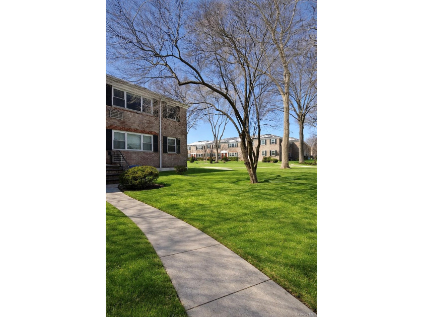 Welcome home to this sun-filled second-floor corner unit in a - photo 10