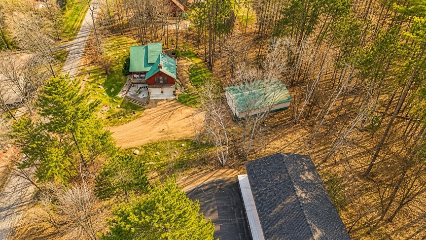 Escape to the beauty of the Northwoods with this one-of-a-kind - photo 35