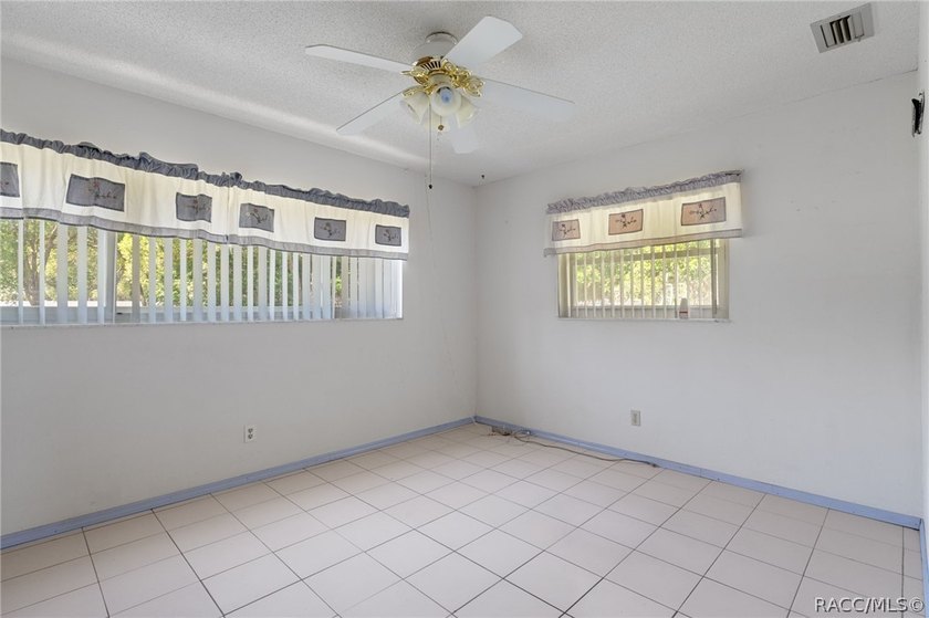 Nestled on approximately 1.6 acres in Homosassa, this charming - photo 11
