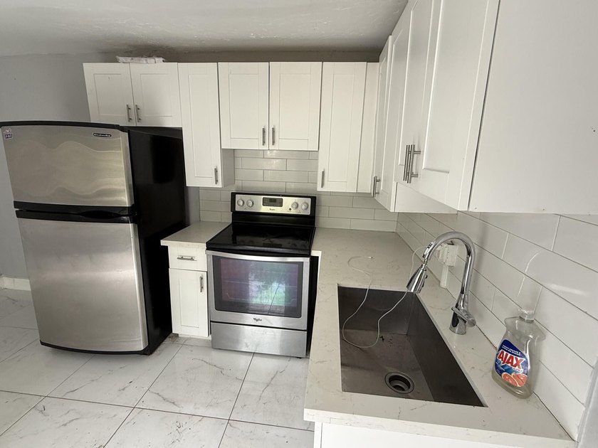Don't miss this beautifully renovated, centrally located - photo 17