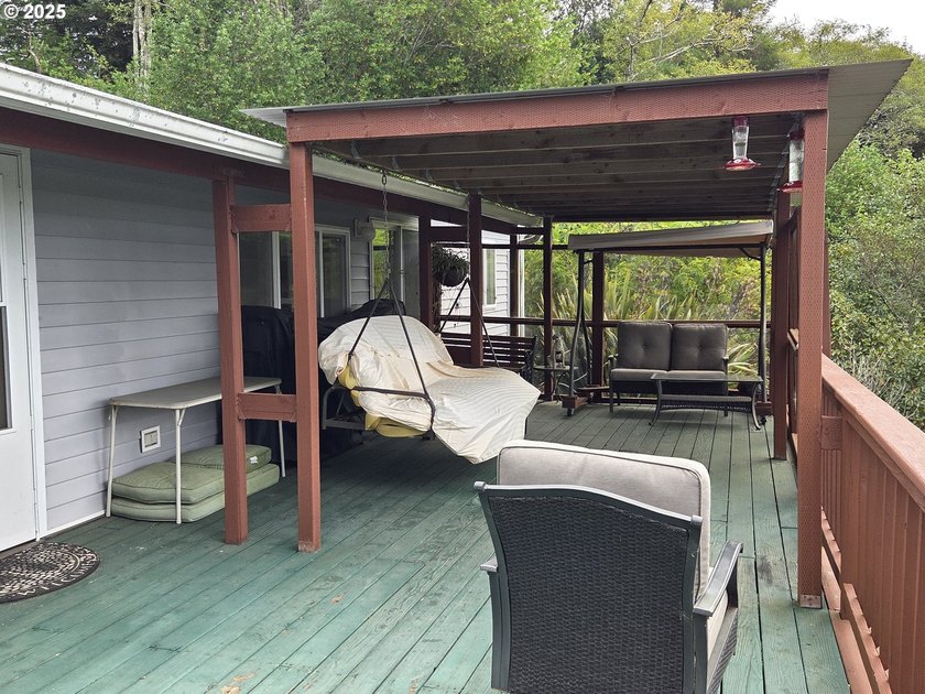 Bright and sunny ocean and forest view home on over 2 acres of - photo 19