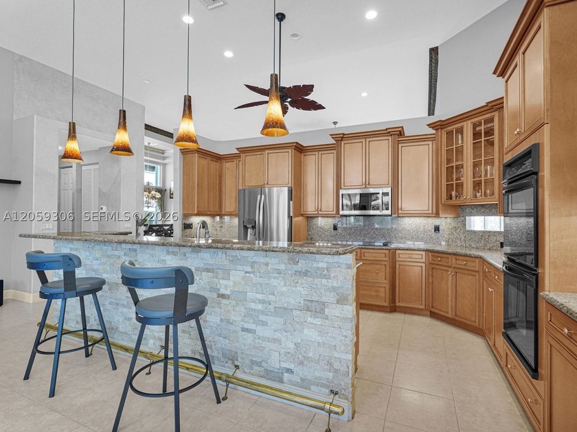 Discover incredible value in prestigious Heron Bay! This - photo 3