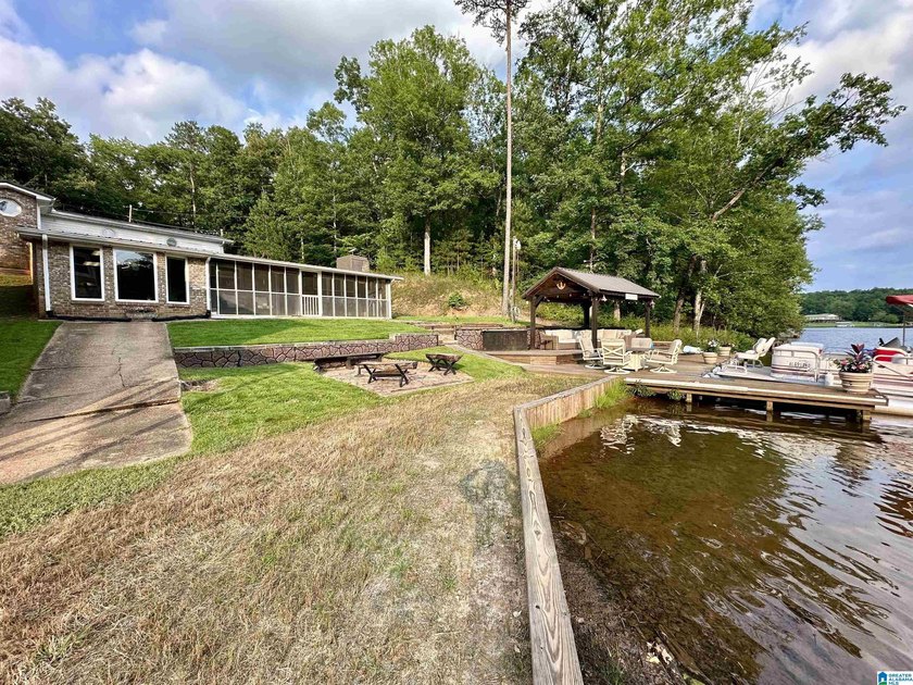 Lakefront Timeless Brick Home! Year-round water on beautiful - photo 9
