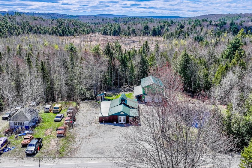 Set on nearly 2 private acres in Freedom, Maine, this unique - photo 3
