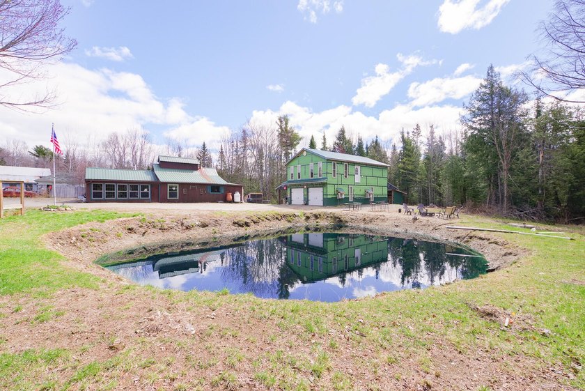 Set on nearly 2 private acres in Freedom, Maine, this unique - photo 6
