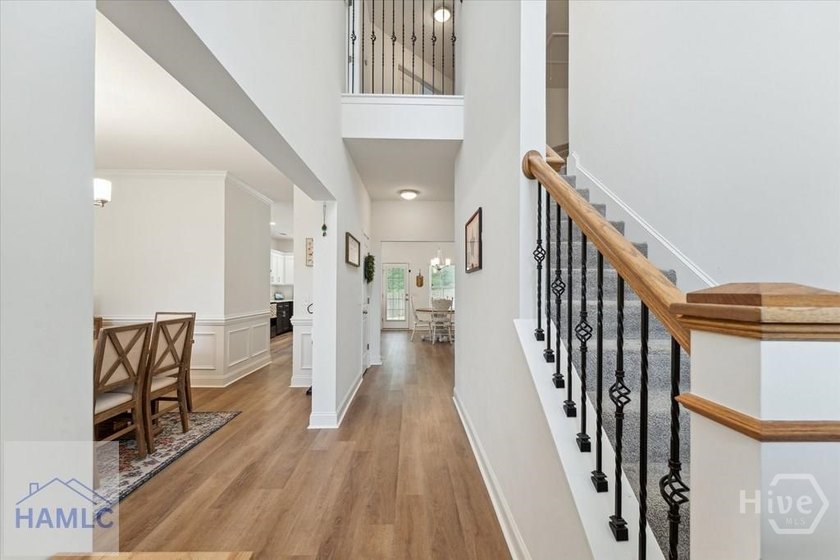 Spacious 4-bedroom 2.5 bath home features grand foyer with - photo 4