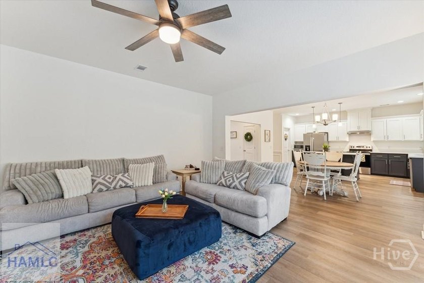 Spacious 4-bedroom 2.5 bath home features grand foyer with - photo 8