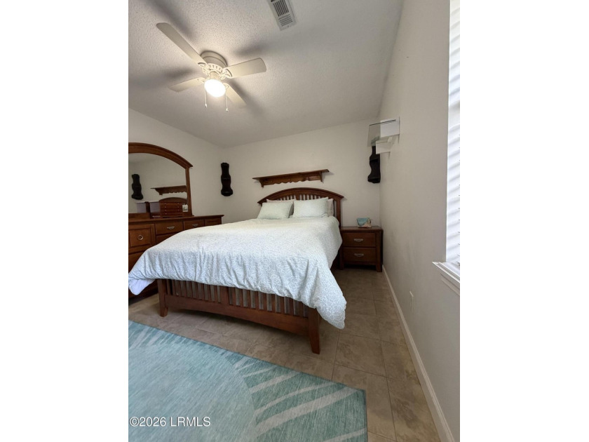 Charming 3-bedroom, 1.5-bath brick home situated on nearly half - photo 17