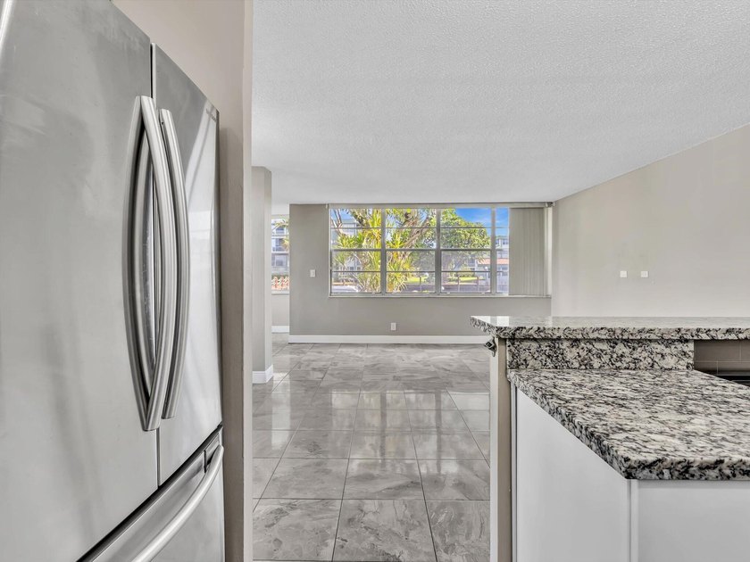 Welcome to Watergate Condominium No. 4 in Hollywood, FL, where - photo 23