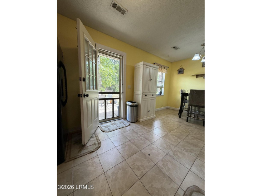 Charming 3-bedroom, 1.5-bath brick home situated on nearly half - photo 31