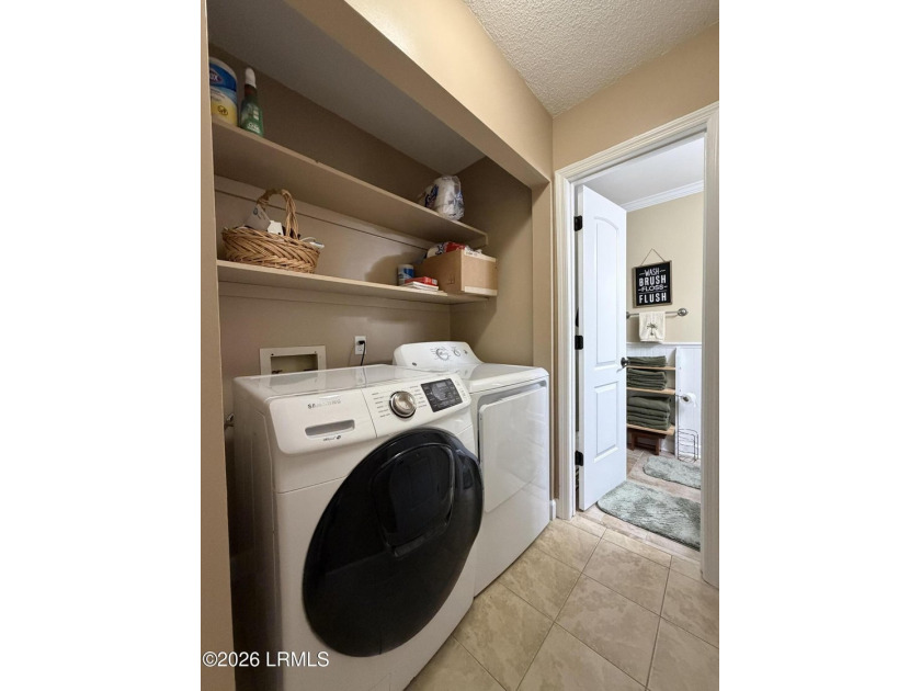 Charming 3-bedroom, 1.5-bath brick home situated on nearly half - photo 34