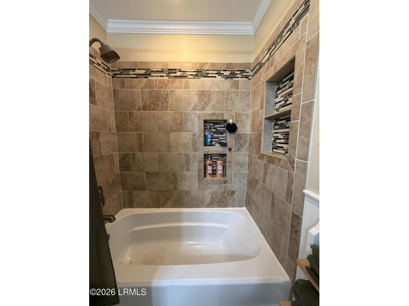 Charming 3-bedroom, 1.5-bath brick home situated on nearly half - photo 36