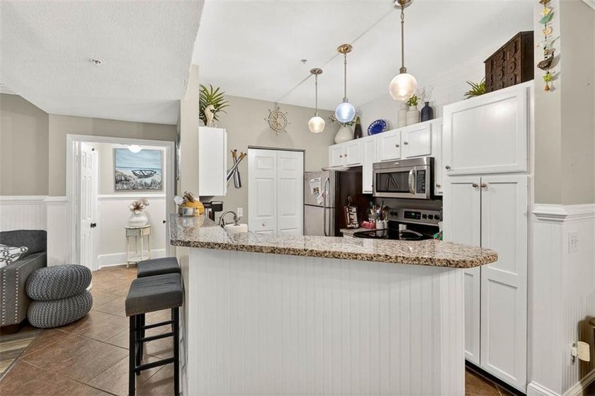 GROUND FLOOR &amp; FULLY FURNISHED!!! Welcome to your dream condo on - photo 2