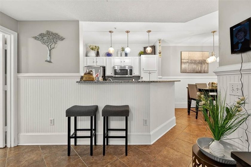 GROUND FLOOR &amp; FULLY FURNISHED!!! Welcome to your dream condo on - photo 4