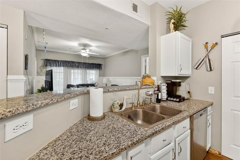 GROUND FLOOR &amp; FULLY FURNISHED!!! Welcome to your dream condo on - photo 9