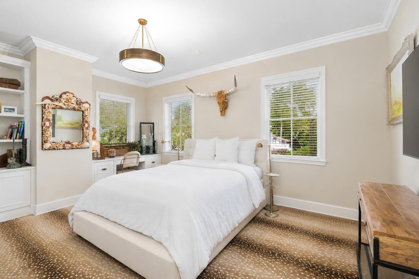 Set on a 16,775 sf, high-elevation lot, this estate showcases - photo 12