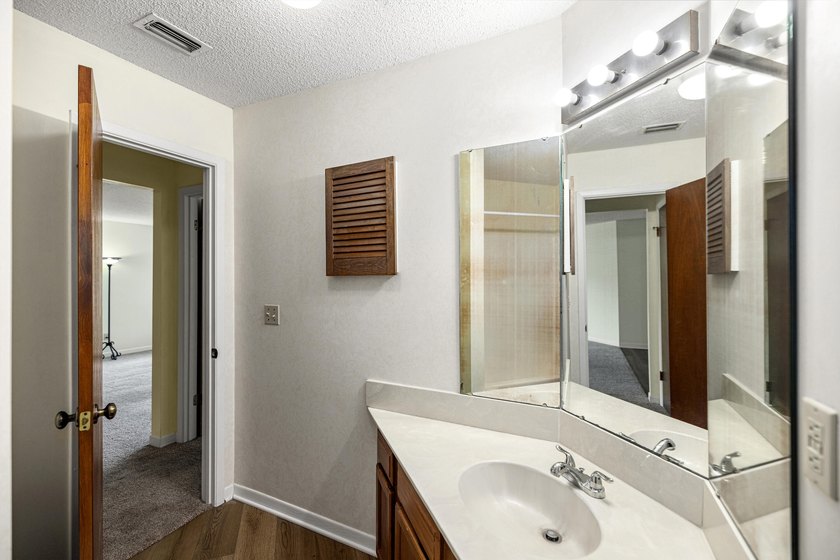 Welcome to this inviting second-floor 1-bedroom, 1-bath condo in - photo 37