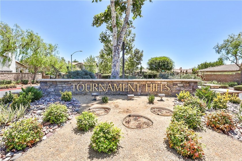 THIS SINGLE STORY HOME IS LOCATED IN THE GATED COMMUNITY OF - photo 2